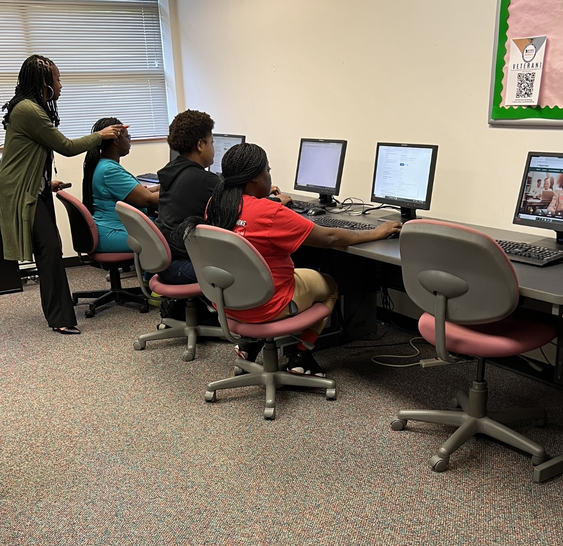 Students in One Stop Center at Waynesboro Site using computers.