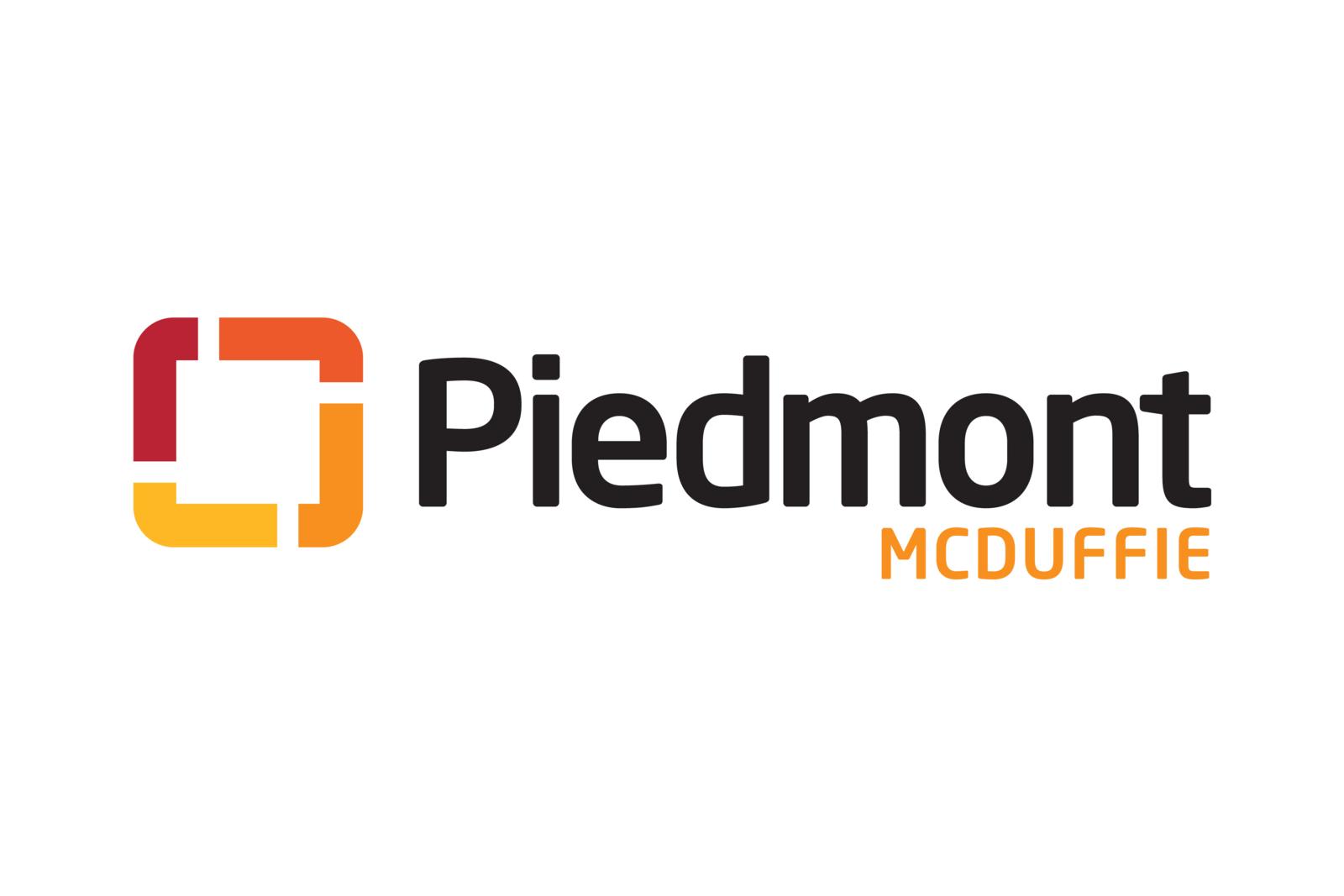 Piedmont McDuffie logo composed of a square made up of four segments colored red, burgundy, gold, and orange. The word Piedmont is in large black font to the right of the squre with the word McDuffie in smaller orange font aligned with the t in Piedmont.